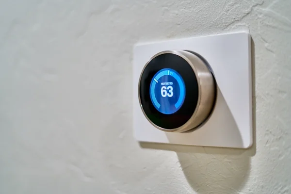 Smart thermostat controlling home heating